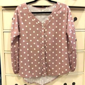Button up blouse. Silky like material. Thinner fabric. Size medium.